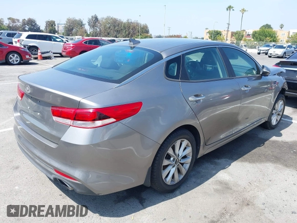 2018 Kia Optima S with VIN 5XXGT4L34JG263479, listed as a IAAI auction lot 42675426 with Not provided miles and . Bid and sale history available at DreamBid. Image 4.