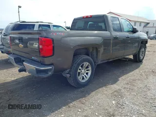 2014 Chevrolet Silverado 1500 LT with VIN 1GCVKREH1EZ179042, listed as a IAAI auction lot 41687742 with 155,389 mi miles and . Bid and sale history available at DreamBid. Image 4.