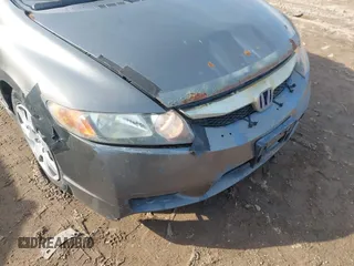 2006 Honda Civic LX z VIN 1HGFA16556L053589, wystawiony jako IAAI lot #41711938 z przebiegiem 230 523 mil mil oraz . Historia ofert i sprzedaży dostępna na DreamBid. Obrazek 6.