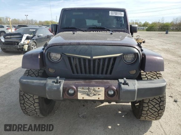 2014 Jeep Wrangler Unlimited Sahara with VIN 1C4BJWEG1EL196129, listed as a Copart auction lot 53700115 with 140,998 mi miles and Clean Title. Bid and sale history available at carsss.com. Image 5.