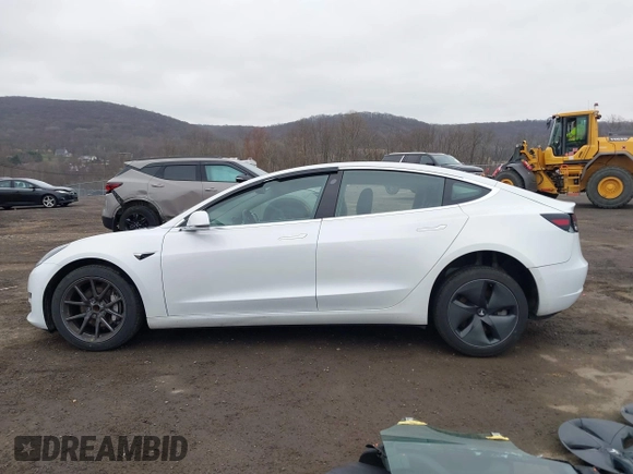 2020 Tesla Model 3 Standard Range Plus with VIN 5YJ3E1EA7LF659172, listed as a IAAI auction lot 42017026 with 32,104 mi miles. Bid and sale history available at carsss.com. Image 14.