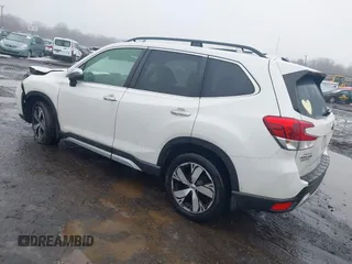 2019 Subaru Forester Touring with VIN JF2SKAWC3KH555900, listed as a IAAI auction lot 41558281 with 138,351 mi miles. Bid and sale history available at carsss.com. Image 3.