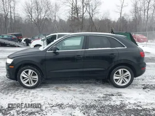 2017 Audi Q3 Premium Plus z VIN WA1JCCFS5HR000986, wystawiony jako IAAI lot #41471543 z przebiegiem 68 087 mil mil oraz . Historia ofert i sprzedaży dostępna na DreamBid. Obrazek 14.