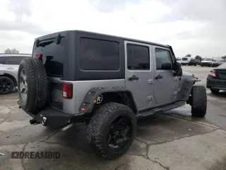 2018 Jeep Wrangler JK Unlimited Sahara with VIN 1C4HJWEG3JL922027, listed as a Copart auction lot 84173794 with 113,226 mi miles and Salvage Title. Bid and sale history available at carsss.com. Image 3.