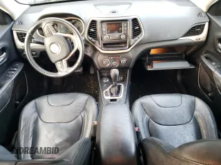 2016 Jeep Cherokee Altitude with VIN 1C4PJMAB1GW309776, listed as a Copart auction lot 81203204 with 105,775 mi miles and Salvage title. Bid and sale history available at DreamBid. Image 8.