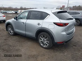 2020 Mazda CX-5 Grand Touring with VIN JM3KFBDM4L0843825, listed as a IAAI auction lot 41733575 with 18,800 mi miles. Bid and sale history available at carsss.com. Image 3.