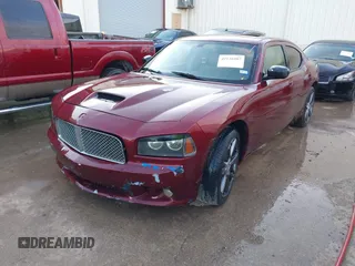 2006 Dodge Charger R/T with VIN 2B3KA53H36H260418, listed as a IAAI auction lot 42126007 with 242,331 mi miles and . Bid and sale history available at carsss.com. Image 2.