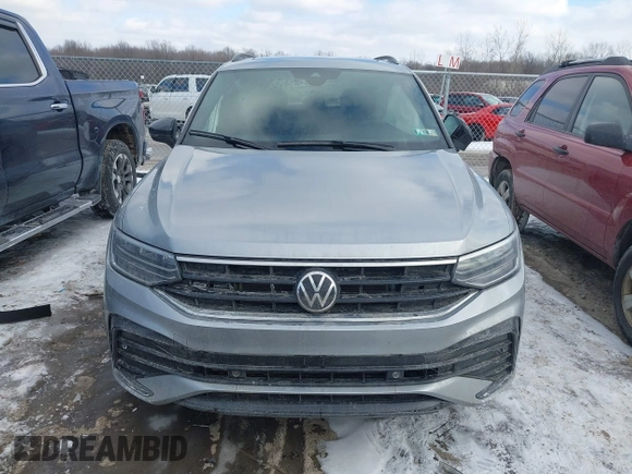 2023 Volkswagen Tiguan SE R-Line Black with VIN 3VV8B7AX3PM106873, listed as a IAAI auction lot 41402146 with 26,701 mi miles and . Bid and sale history available at DreamBid. Image 12.