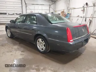 2010 Cadillac DTS w/1SC with VIN 1G6KD5EY7AU125289, listed as a IAAI auction lot 41836355 with 135,784 mi miles. Bid and sale history available at carsss.com. Image 3.