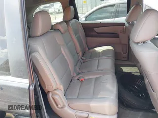 2011 Honda Odyssey EX-L with VIN 5FNRL5H62BB063125, listed as a IAAI auction lot 42562541 with 140,787 mi miles and . Bid and sale history available at DreamBid. Image 8.