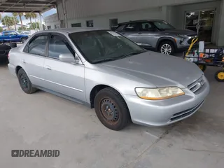 2001 Honda Accord LX with VIN 1HGCG55401A063548, listed as a IAAI auction lot 42651792 with 215,058 mi miles and . Bid and sale history available at DreamBid. Image 1.