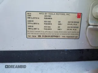 2014 Tesla Model S 60 with VIN 5YJSA1H1XEFP40611, listed as a IAAI auction lot 42826752 with Not provided miles and . Bid and sale history available at DreamBid. Image 9.