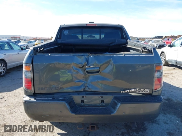 2007 Honda Ridgeline RTL z VIN 2HJYK16547H526249, wystawiony jako IAAI lot #41769625 z przebiegiem 173 168 mil mil oraz . Historia ofert i sprzedaży dostępna na DreamBid. Obrazek 16.