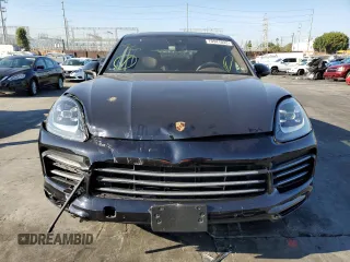 2021 Porsche Cayenne z VIN WP1AA2AY7MDA00348, wystawiony jako Copart lot #70941032 z przebiegiem 22 755 mil mil oraz . Historia ofert i sprzedaży dostępna na DreamBid. Obrazek 5.