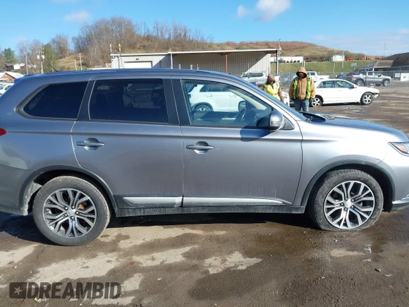 2016 Mitsubishi Outlander SE with VIN JA4AZ3A30GZ039451, listed as a IAAI auction lot 41839444 with 151,357 mi miles and . Bid and sale history available at DreamBid. Image 13.
