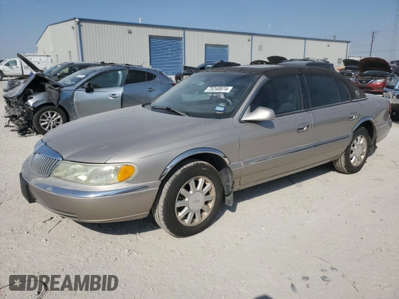2002 Lincoln Continental with VIN 1LNHM97V32Y647800, listed as a Copart auction lot 75240874 with 71,689 mi miles and Salvage Title. Bid and sale history available at carsss.com. Image 1.