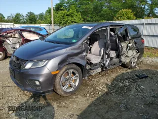 2019 Honda Odyssey EX with VIN 5FNRL6H58KB013889, listed as a Copart auction lot 57077025 with 126,467 mi miles and Salvage title. Bid and sale history available at DreamBid. Image 1.