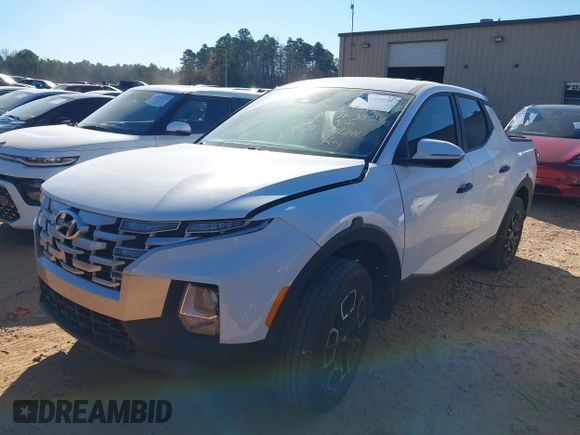 2023 Hyundai Santa Cruz SEL z VIN 5NTJB4AE7PH043443, wystawiony jako IAAI lot #41040006 z przebiegiem 43 504 mil mil oraz . Historia ofert i sprzedaży dostępna na DreamBid. Obrazek 2.