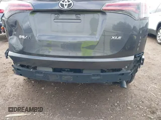 2018 Toyota RAV4 XLE with VIN 2T3WFREV4JW417555, listed as a IAAI auction lot 41092589 with 93,788 mi miles and . Bid and sale history available at DreamBid. Image 6.