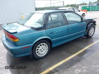 1995 Saturn SL with VIN 1G8ZK5271SZ147168, listed as a IAAI auction lot 42480978 with 159,136 mi miles and . Bid and sale history available at DreamBid. Image 4.