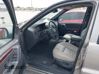 2001 Jeep Grand Cherokee Limited with VIN 1J4GW58N21C655426, listed as a IAAI auction lot 42280177 with 110,207 mi miles and . Bid and sale history available at DreamBid. Image 12.