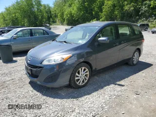 2012 Mazda 5 Sport z VIN JM1CW2BL4C0121052, wystawiony jako Copart lot #57563015 z przebiegiem 121 581 mil mil oraz Szkoda całkowita • Salvage title. Historia ofert i sprzedaży dostępna na DreamBid. Obrazek 1.