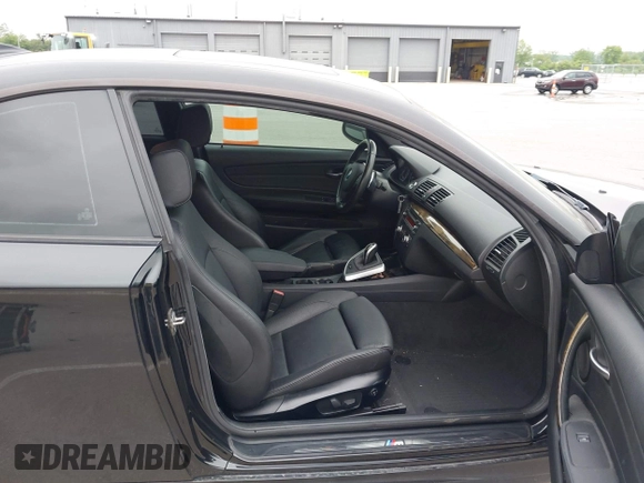2012 BMW 1 Series 135i with VIN WBAUC9C5XCVM12693, listed as a IAAI auction lot 42341971 with 121,596 mi miles and . Bid and sale history available at DreamBid. Image 5.
