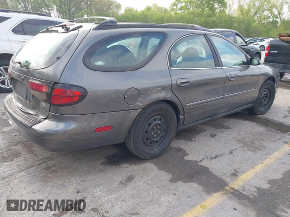 2003 Ford Taurus SE Standard with VIN 1FAFP58U63G117125, listed as a IAAI auction lot 42061812 with 172,154 mi miles. Bid and sale history available at carsss.com. Image 4.