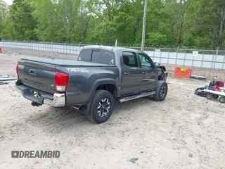 2017 Toyota Tacoma SR5 with VIN 3TMAZ5CN7HM026618, listed as a IAAI auction lot 42033682 with 96,430 mi miles and . Bid and sale history available at carsss.com. Image 4.