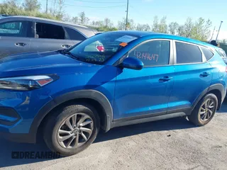 2018 Hyundai Tucson SE z VIN KM8J2CA40JU792495, wystawiony jako IAAI lot #42144647 z przebiegiem 62 769 mil mil oraz . Historia ofert i sprzedaży dostępna na DreamBid. Obrazek 14.
