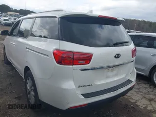 2021 Kia Sedona LX with VIN KNDMB5C11M6671063, listed as a IAAI auction lot 41951433 with 130,891 mi miles. Bid and sale history available at carsss.com. Image 3.
