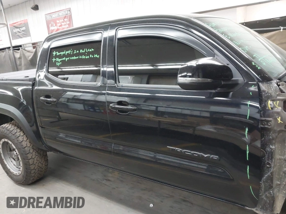 2021 Toyota Tacoma SR with VIN 3TMCZ5AN4MM448304, listed as a IAAI auction lot 42046932 with 56,161 mi miles and . Bid and sale history available at DreamBid. Image 13.