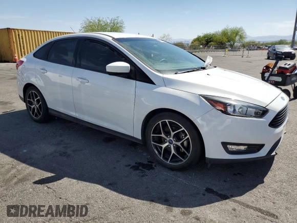 2018 Ford Focus SE with VIN 1FADP3FE4JL322857, listed as a Copart auction lot 58090025 with 58,148 mi miles and Clean title. Bid and sale history available at DreamBid. Image 4.