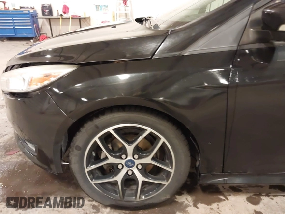 2015 Ford Focus SE with VIN 1FADP3F24FL255450, listed as a IAAI auction lot 41673301 with 103,650 mi miles. Bid and sale history available at carsss.com. Image 18.