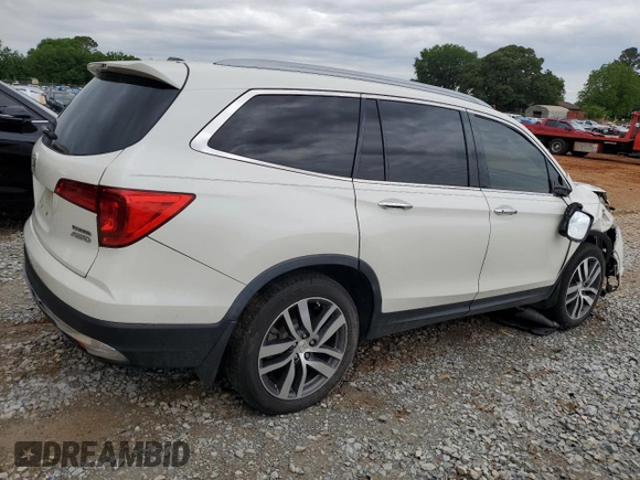 2017 Honda Pilot Touring z VIN 5FNYF6H92HB067140, wystawiony jako Copart lot #55757925 z przebiegiem 132 425 mil mil oraz Szkoda całkowita • Salvage title. Historia ofert i sprzedaży dostępna na DreamBid. Obrazek 3.