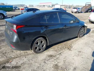 2019 Toyota Prius L Eco with VIN JTDKARFU9K3091887, listed as a IAAI auction lot 41282017 with 240,000 mi miles. Bid and sale history available at carsss.com. Image 4.
