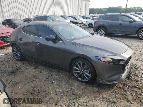 2019 Mazda 3 with VIN JM1BPAJMXK1119912, listed as a Copart auction lot 59708825 with 50,459 mi miles and Salvage title. Bid and sale history available at DreamBid. Image 4.