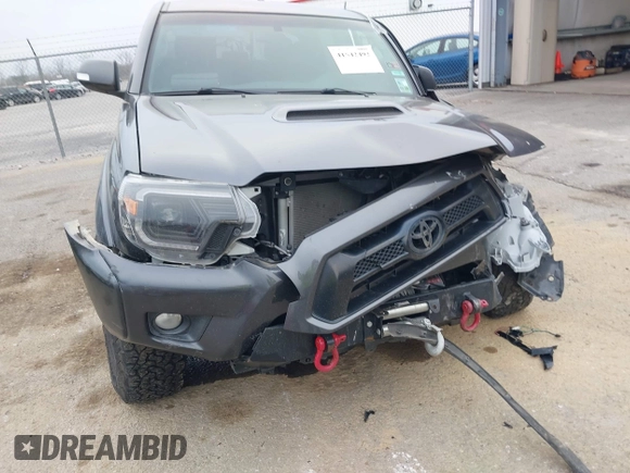 2014 Toyota Tacoma z VIN 3TMMU4FN9EM066292, wystawiony jako IAAI lot #41542492 z przebiegiem 122 308 mil mil oraz . Historia ofert i sprzedaży dostępna na DreamBid. Obrazek 6.