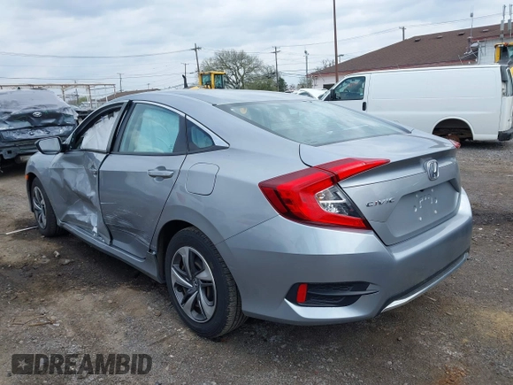 2020 Honda Civic LX with VIN 2HGFC2F65LH544133, listed as a IAAI auction lot 42148441 with 49,063 mi miles and . Bid and sale history available at DreamBid. Image 3.