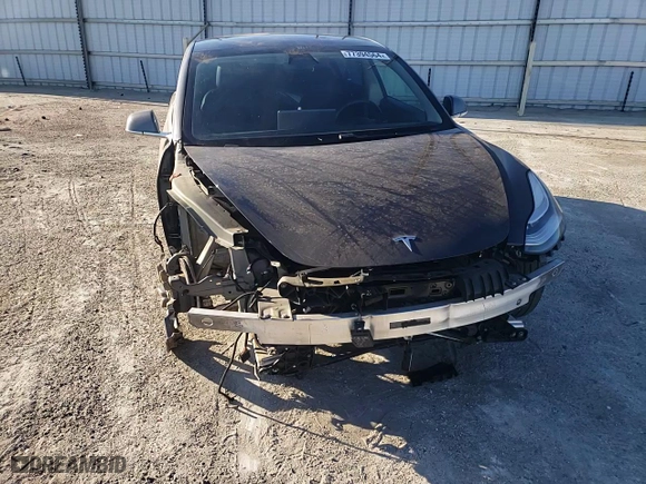 2020 Tesla Model 3 Standard Range Plus with VIN 5YJ3E1EA7LF803660, listed as a Copart auction lot 77394564 with 61,062 mi miles and Salvage Title. Bid and sale history available at carsss.com. Image 11.