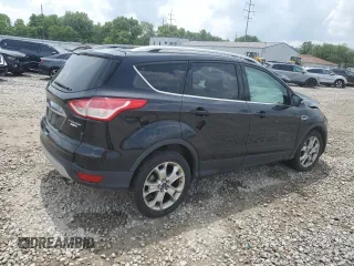 2015 Ford Escape Titanium with VIN 1FMCU9J91FUA38787, listed as a Copart auction lot 59749735 with 132,536 mi miles and Salvage title. Bid and sale history available at DreamBid. Image 3.