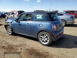 2011 MINI Hardtop S with VIN WMWSV3C57BTY13899, listed as a Copart auction lot 55802555 with 73,012 mi miles and Salvage title. Bid and sale history available at DreamBid. Image 2.
