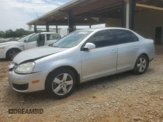 2009 Volkswagen Jetta S с VIN 3VWJM71K49M167924, выставлен на аукционе Copart как лот 57287285 с пробегом 72 551 миль миль и Чистый • Clean title. История ставок и продаж доступна на DreamBid. Изображение 1.