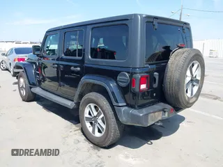 2020 Jeep Wrangler Unlimited Sahara with VIN 1C4HJXEN6LW235159, listed as a IAAI auction lot 42045083 with 68,400 mi miles and . Bid and sale history available at DreamBid. Image 3.