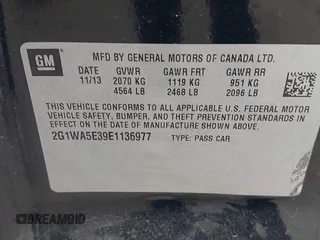 2014 Chevrolet Impala LS with VIN 2G1WA5E39E1136977, listed as a IAAI auction lot 41843947 with 122,709 mi miles and . Bid and sale history available at DreamBid. Image 9.