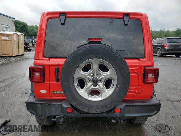 2021 Jeep Wrangler Unlimited Freedom with VIN 1C4HJXDN0MW605573, listed as a Copart auction lot 59896165 with 55,751 mi miles and Salvage title. Bid and sale history available at DreamBid. Image 6.