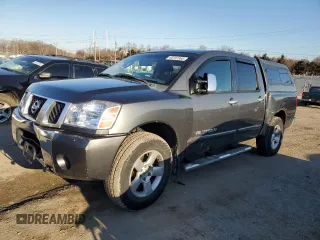 2005 Nissan Titan SE with VIN 1N6BA07BX5N557633, listed as a Copart auction lot 45197365 with 214,516 mi miles and Clean Title. Bid and sale history available at DreamBid. Image 1.