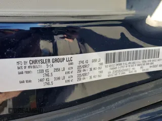 2014 Dodge Grand Caravan SE with VIN 2C4RDGBG4ER400512, listed as a Copart auction lot 52416965 with 141,475 mi miles and Clean Title. Bid and sale history available at DreamBid. Image 13.