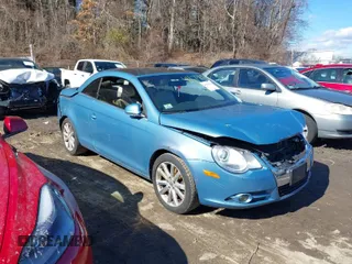 2007 Volkswagen Eos 2.0T with VIN WVWFA71FX7V051232, listed as a IAAI auction lot 41674652 with 88,617 mi miles and . Bid and sale history available at DreamBid. Image 1.