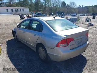 2009 Honda Civic Hybrid with VIN JHMFA36249S000925, listed as a IAAI auction lot 41823981 with 201,346 mi miles. Bid and sale history available at carsss.com. Image 3.